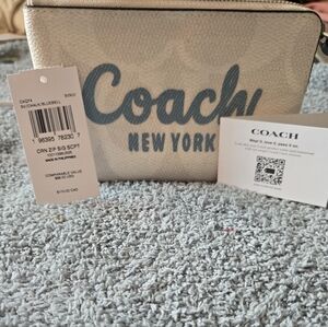 Coach Cream and Blue Wristlet